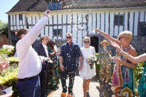 Confetti thrown at a wedding in Anne pf Cleves House - Photographer-Richard-Entwhistle