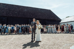 A wedding party at Michelham Priory, a Sussex wedding venue