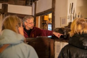 A group visit to learn about Sussex history at The Priest House