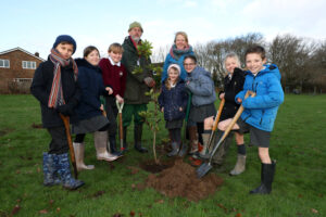 Community tree planting at Fishbourne Roman Palace with pupils from Fishbourne Roman Palace - made possible with support from The Tree Council and Chichester Dsitrict Council